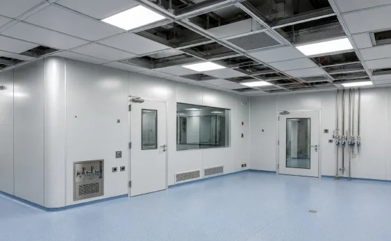 Cleanroom ceiling grid and modular clean room panels integrated with HVAC airlock and pass box systems for pharmacy cleanroom selection planning