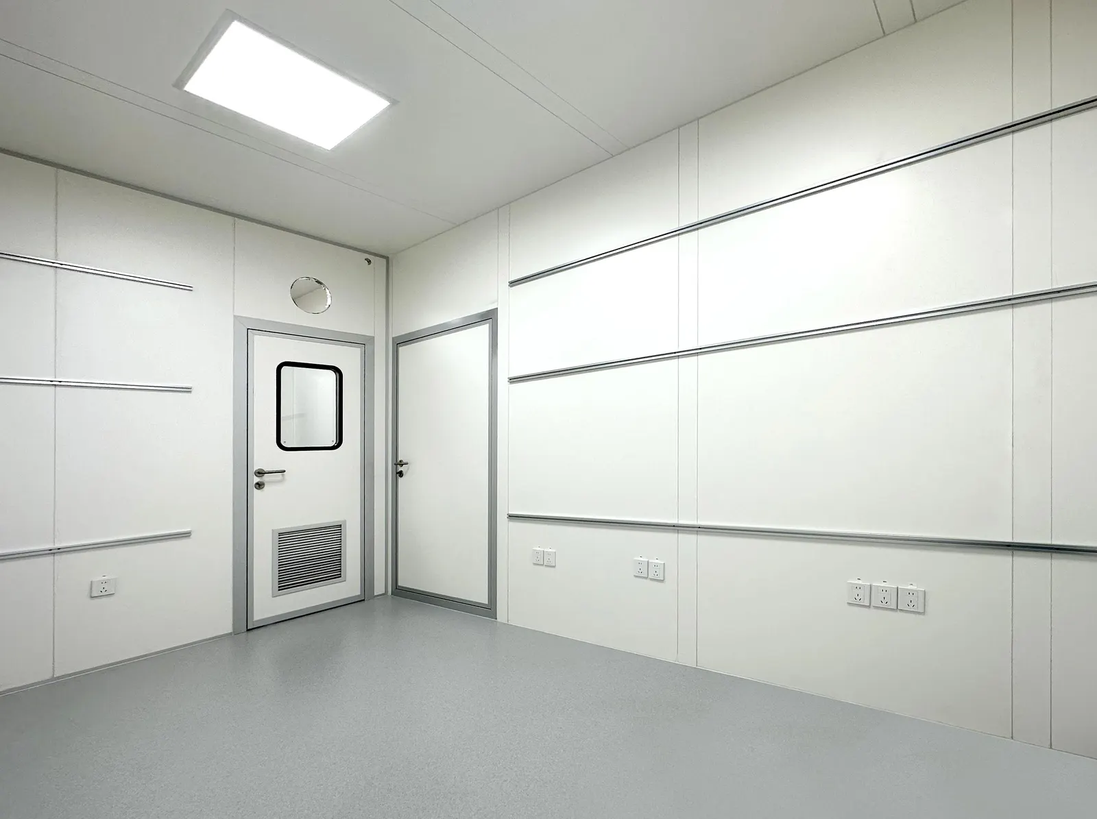 Interior of a container cleanroom laboratory with sealed panels and integrated return grille