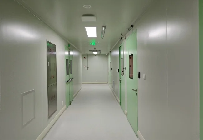 Real modular pharmacy cleanroom corridor with cleanroom doors and pressure-controlled rooms