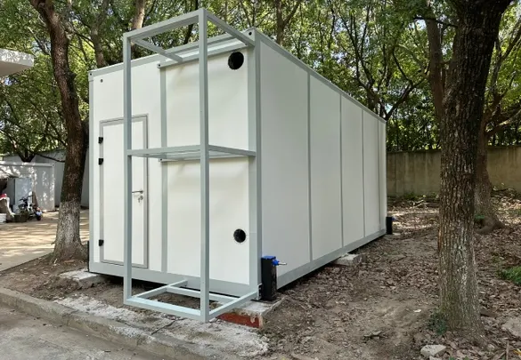 Onsite container laboratory exterior with modular cleanroom wall panels service frame and cleanroom access door