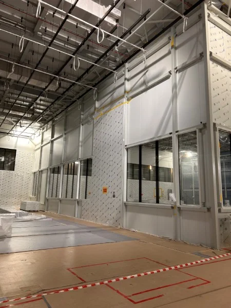 Wonclean Russia FAB 300 cleanroom project photo showing high wall panels, observation windows and overhead HVAC coordination