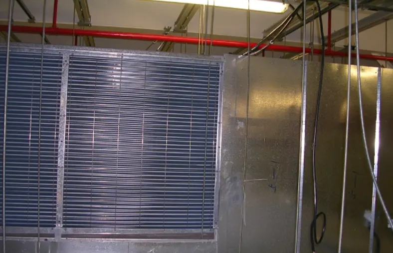 Wonclean real project photo showing a return air louver integrated into cleanroom partition construction behind service space